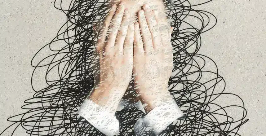 stress-concept-young-businessman-covering-face-hands-abstract-background-scribble-92412680